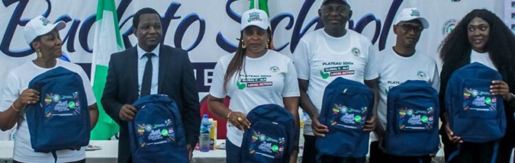 L-R: Mrs. Nanbam Danjuma-Lot, Project Coordinator of the Plateau State Sustainable Development Goals (SDGs); Mr. Shunom Leo, Branch Leader, Fidelity Bank University of Jos Branch; Ms. Caroline Dafur, Plateau State Commissioner for Women Affairs and Social Development; Hon. Sunday Amuna, Executive Chairman, Plateau State Universal Basic Education Board (SUBEB); Mr. Saje Joseph, Director of Planning, Research, and Statistics, Plateau State Ministry of Education; and Mrs. Victoria Abuka, Team Lead, Corporate Social Responsibility, Fidelity Bank Plc; at the Fidelity Helping Hands Programme (FHHP) Back-to-School outreach in Plateau State recently.