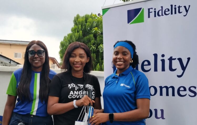L-R: Team Lead, Corporate Social Responsibility (CSR), Fidelity Bank Plc, Victoria Abuka; Assistant General Manager, Heritage Homes Orphanage, Irene Light; and President, Audacious Inductees Class of 2026, Fidelity Bank Plc, Aanuoluwa Akinyemi; during the Fidelity Helping Hands Programme (FHHP) Outreach at Heritage Homes Orphanage, Anthony, Lagos recently.